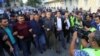 Председатель “Народного фронта Азербайджана” Али Керимли (в центре) на протестной акции в Баку. Октябрь 2019 года